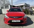 Красный Хендай i30, объемом двигателя 1.6 л и пробегом 232 тыс. км за 6750 $, фото 1 на Automoto.ua