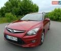 Красный Хендай i30, объемом двигателя 1.4 л и пробегом 149 тыс. км за 7200 $, фото 1 на Automoto.ua