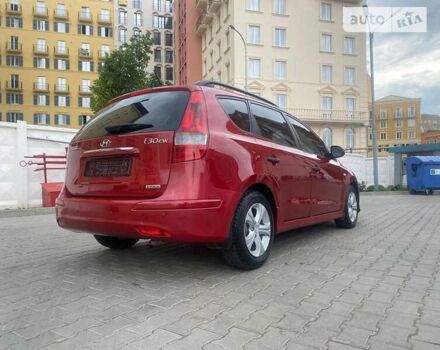 Червоний Хендай i30, об'ємом двигуна 1.59 л та пробігом 240 тис. км за 8300 $, фото 2 на Automoto.ua