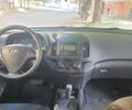 Червоний Хендай i30, об'ємом двигуна 1.6 л та пробігом 292 тис. км за 7999 $, фото 6 на Automoto.ua
