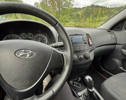 Червоний Хендай i30, об'ємом двигуна 1.4 л та пробігом 231 тис. км за 6300 $, фото 8 на Automoto.ua