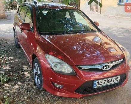 Червоний Хендай i30, об'ємом двигуна 1.6 л та пробігом 292 тис. км за 7999 $, фото 6 на Automoto.ua