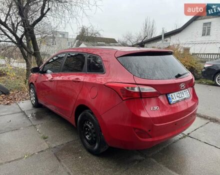 Красный Хендай i30, объемом двигателя 1.58 л и пробегом 180 тыс. км за 4700 $, фото 5 на Automoto.ua