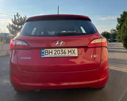 Красный Хендай i30, объемом двигателя 1.4 л и пробегом 190 тыс. км за 6900 $, фото 3 на Automoto.ua