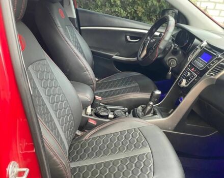 Красный Хендай i30, объемом двигателя 1.4 л и пробегом 254 тыс. км за 6100 $, фото 5 на Automoto.ua