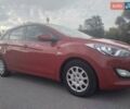 Красный Хендай i30, объемом двигателя 1.4 л и пробегом 295 тыс. км за 7950 $, фото 6 на Automoto.ua
