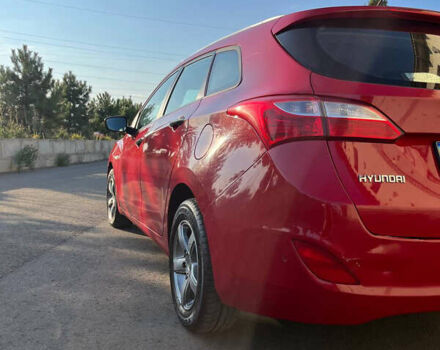 Красный Хендай i30, объемом двигателя 1.4 л и пробегом 190 тыс. км за 6900 $, фото 5 на Automoto.ua