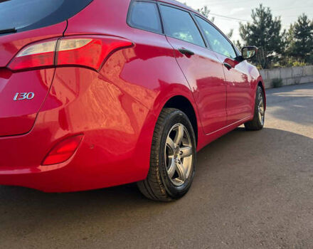 Красный Хендай i30, объемом двигателя 1.4 л и пробегом 190 тыс. км за 6900 $, фото 2 на Automoto.ua