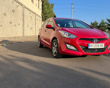 Красный Хендай i30, объемом двигателя 1.4 л и пробегом 190 тыс. км за 6900 $, фото 1 на Automoto.ua