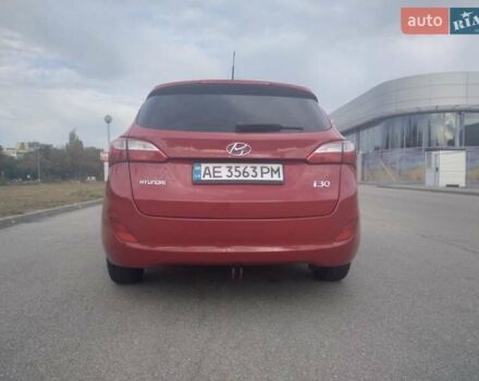 Красный Хендай i30, объемом двигателя 1.4 л и пробегом 295 тыс. км за 7950 $, фото 12 на Automoto.ua