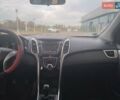 Красный Хендай i30, объемом двигателя 1.4 л и пробегом 295 тыс. км за 7950 $, фото 11 на Automoto.ua