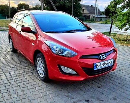Красный Хендай i30, объемом двигателя 1.4 л и пробегом 148 тыс. км за 7600 $, фото 2 на Automoto.ua