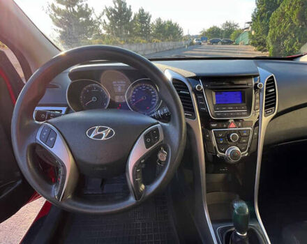 Красный Хендай i30, объемом двигателя 1.4 л и пробегом 190 тыс. км за 6900 $, фото 6 на Automoto.ua