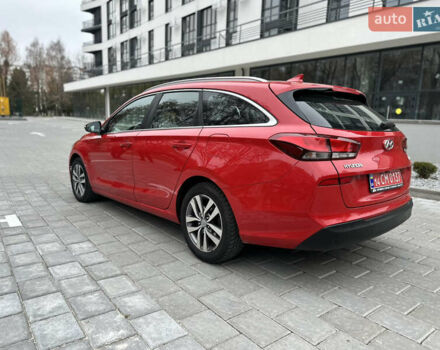 Красный Хендай i30, объемом двигателя 1.4 л и пробегом 240 тыс. км за 10500 $, фото 3 на Automoto.ua