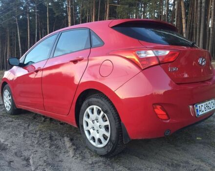 Червоний Хендай i30, об'ємом двигуна 1.4 л та пробігом 200 тис. км за 6700 $, фото 1 на Automoto.ua