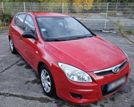 Красный Хендай i30, объемом двигателя 1.4 л и пробегом 197 тыс. км за 4041 $, фото 1 на Automoto.ua