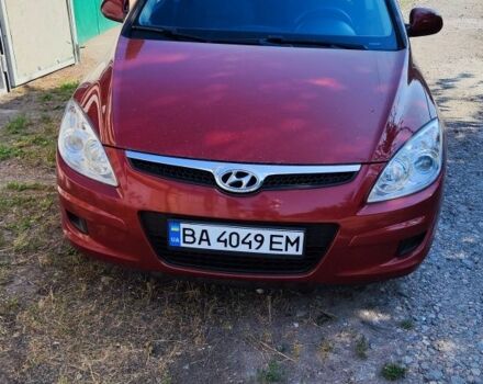 Красный Хендай i30, объемом двигателя 1.4 л и пробегом 334 тыс. км за 5000 $, фото 1 на Automoto.ua