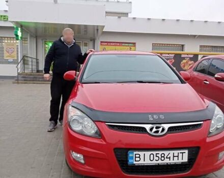 Красный Хендай i30, объемом двигателя 1.4 л и пробегом 206 тыс. км за 6150 $, фото 1 на Automoto.ua