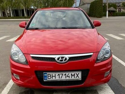 Красный Хендай i30, объемом двигателя 1.58 л и пробегом 236 тыс. км за 5000 $, фото 1 на Automoto.ua