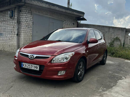 Красный Хендай i30, объемом двигателя 1.6 л и пробегом 186 тыс. км за 6399 $, фото 1 на Automoto.ua