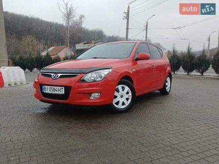 Красный Хендай i30, объемом двигателя 1.4 л и пробегом 208 тыс. км за 5700 $, фото 1 на Automoto.ua