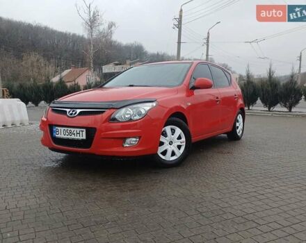 Червоний Хендай i30, об'ємом двигуна 1.4 л та пробігом 208 тис. км за 5700 $, фото 1 на Automoto.ua