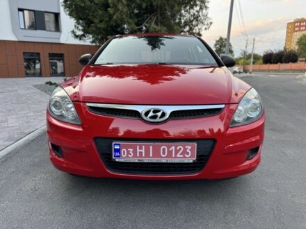 Красный Хендай i30, объемом двигателя 1.4 л и пробегом 202 тыс. км за 5999 $, фото 1 на Automoto.ua