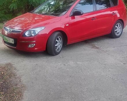 Красный Хендай i30, объемом двигателя 1.6 л и пробегом 217 тыс. км за 4950 $, фото 1 на Automoto.ua