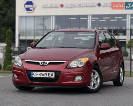 Красный Хендай i30, объемом двигателя 1.6 л и пробегом 190 тыс. км за 6350 $, фото 1 на Automoto.ua