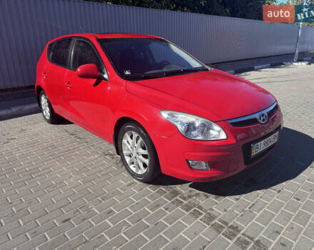 Красный Хендай i30, объемом двигателя 1.6 л и пробегом 159 тыс. км за 7399 $, фото 1 на Automoto.ua