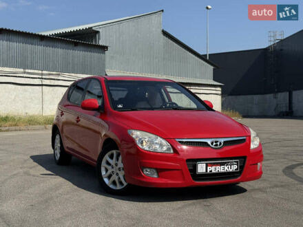Красный Хендай i30, объемом двигателя 1.59 л и пробегом 159 тыс. км за 7399 $, фото 1 на Automoto.ua