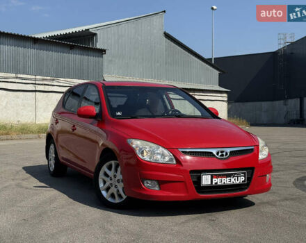 Красный Хендай i30, объемом двигателя 1.59 л и пробегом 159 тыс. км за 7399 $, фото 1 на Automoto.ua