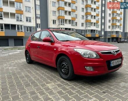 Красный Хендай i30, объемом двигателя 1.4 л и пробегом 234 тыс. км за 5250 $, фото 1 на Automoto.ua