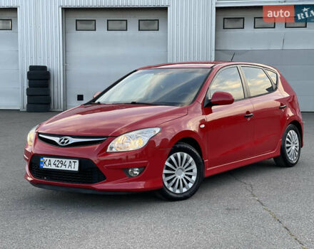 Красный Хендай i30, объемом двигателя 1.59 л и пробегом 166 тыс. км за 7500 $, фото 1 на Automoto.ua
