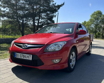 Червоний Хендай i30, об'ємом двигуна 1.4 л та пробігом 229 тис. км за 6300 $, фото 1 на Automoto.ua