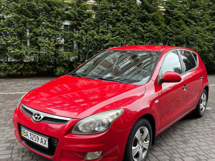 Красный Хендай i30, объемом двигателя 1.59 л и пробегом 195 тыс. км за 7200 $, фото 1 на Automoto.ua