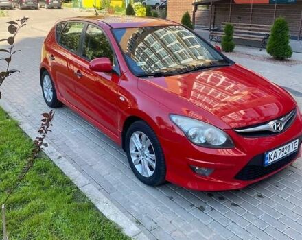 Красный Хендай i30, объемом двигателя 1.58 л и пробегом 202 тыс. км за 5900 $, фото 1 на Automoto.ua
