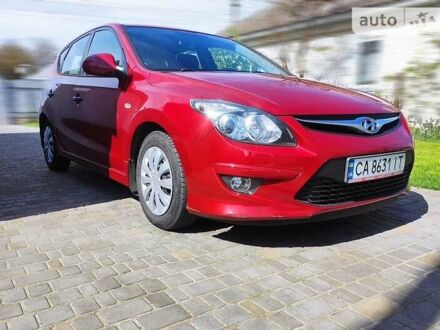 Хендай i30 2011 у Черкасах на Automoto.ua Червоний Хендай i30, об'ємом двигуна 1.4 л та пробігом 133 тис. км за 6700 $, фото 1 на Automoto.ua