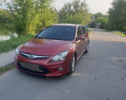 Красный Хендай i30, объемом двигателя 1.6 л и пробегом 250 тыс. км за 6900 $, фото 1 на Automoto.ua