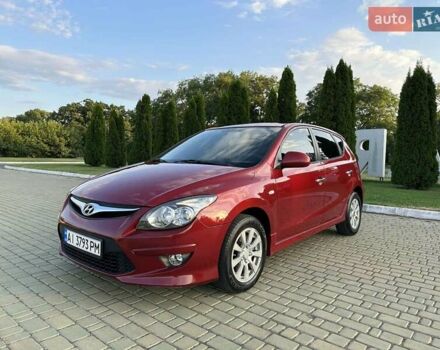 Червоний Хендай i30, об'ємом двигуна 1.4 л та пробігом 261 тис. км за 5699 $, фото 1 на Automoto.ua