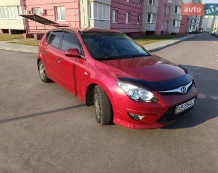 Красный Хендай i30, объемом двигателя 1.58 л и пробегом 168 тыс. км за 6350 $, фото 1 на Automoto.ua