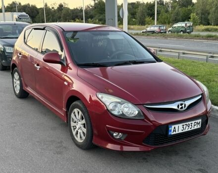 Красный Хендай i30, объемом двигателя 1.4 л и пробегом 261 тыс. км за 4450 $, фото 1 на Automoto.ua