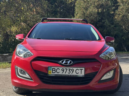 Красный Хендай i30, объемом двигателя 1.59 л и пробегом 61 тыс. км за 13000 $, фото 1 на Automoto.ua