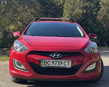 Червоний Хендай i30, об'ємом двигуна 1.59 л та пробігом 61 тис. км за 13000 $, фото 1 на Automoto.ua