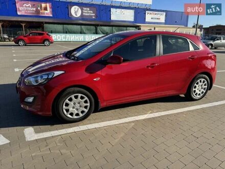 Красный Хендай i30, объемом двигателя 1.59 л и пробегом 131 тыс. км за 9000 $, фото 1 на Automoto.ua