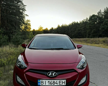 Червоний Хендай i30, об'ємом двигуна 1.59 л та пробігом 182 тис. км за 9200 $, фото 1 на Automoto.ua