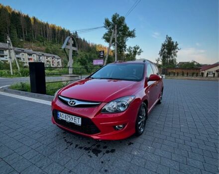Красный Хендай i30, объемом двигателя 1.4 л и пробегом 230 тыс. км за 6800 $, фото 1 на Automoto.ua