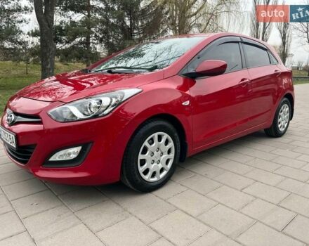 Червоний Хендай i30, об'ємом двигуна 1.59 л та пробігом 116 тис. км за 9500 $, фото 1 на Automoto.ua
