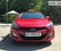 Червоний Хендай i30, об'ємом двигуна 1.4 л та пробігом 59 тис. км за 10400 $, фото 1 на Automoto.ua