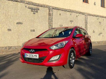 Красный Хендай i30, объемом двигателя 1.4 л и пробегом 190 тыс. км за 6900 $, фото 1 на Automoto.ua